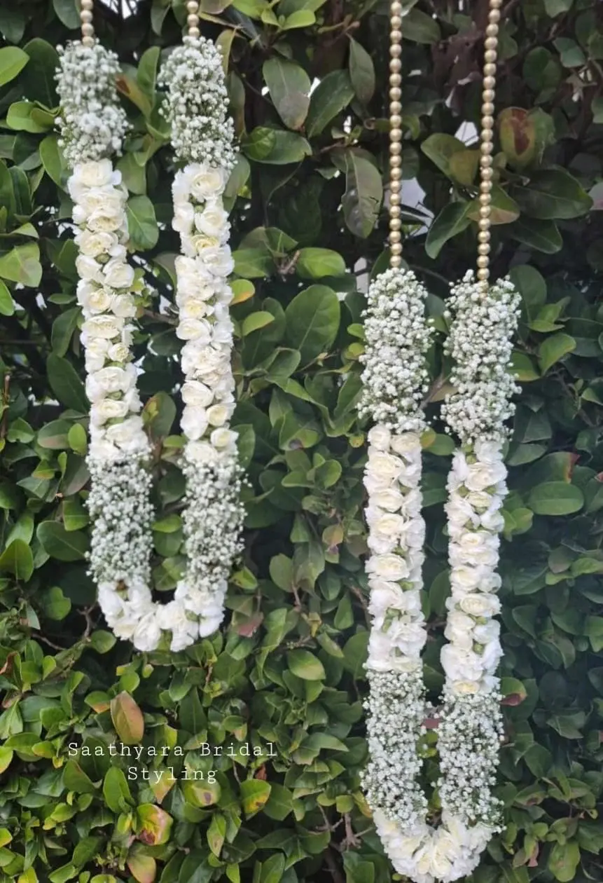 Baby's breath and white rose garland for Indian wedding